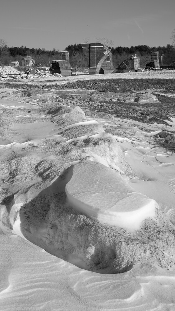 Ice and snow on Schoharie Creek lead the eye to the fallen arches at Schoharie Aqueduct