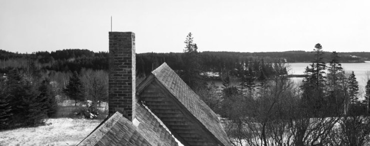 Looking out a 3rd-floor window towards the east and the cove of water.